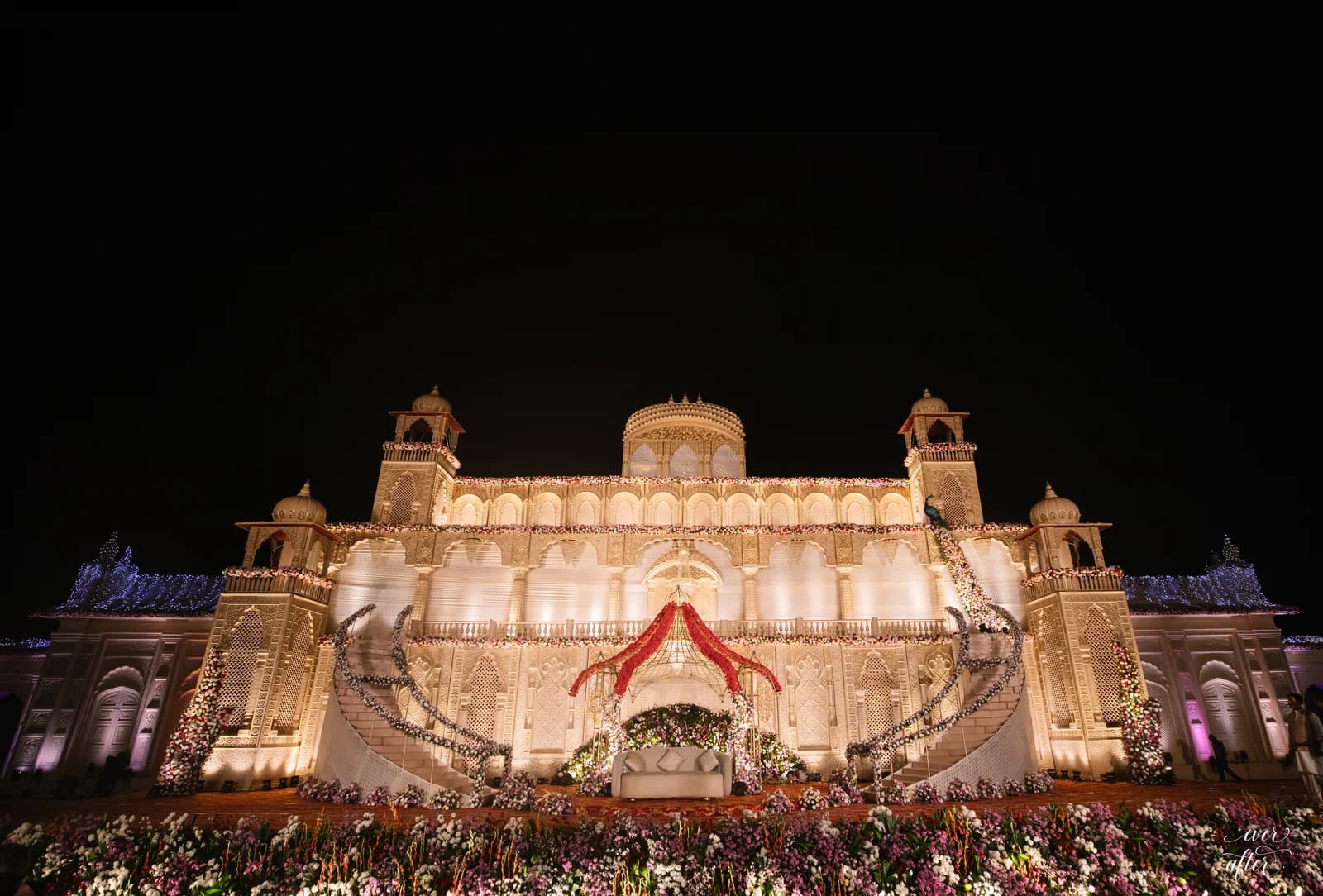 Real Eternal Weddingz wedding stage decor at a palace venue